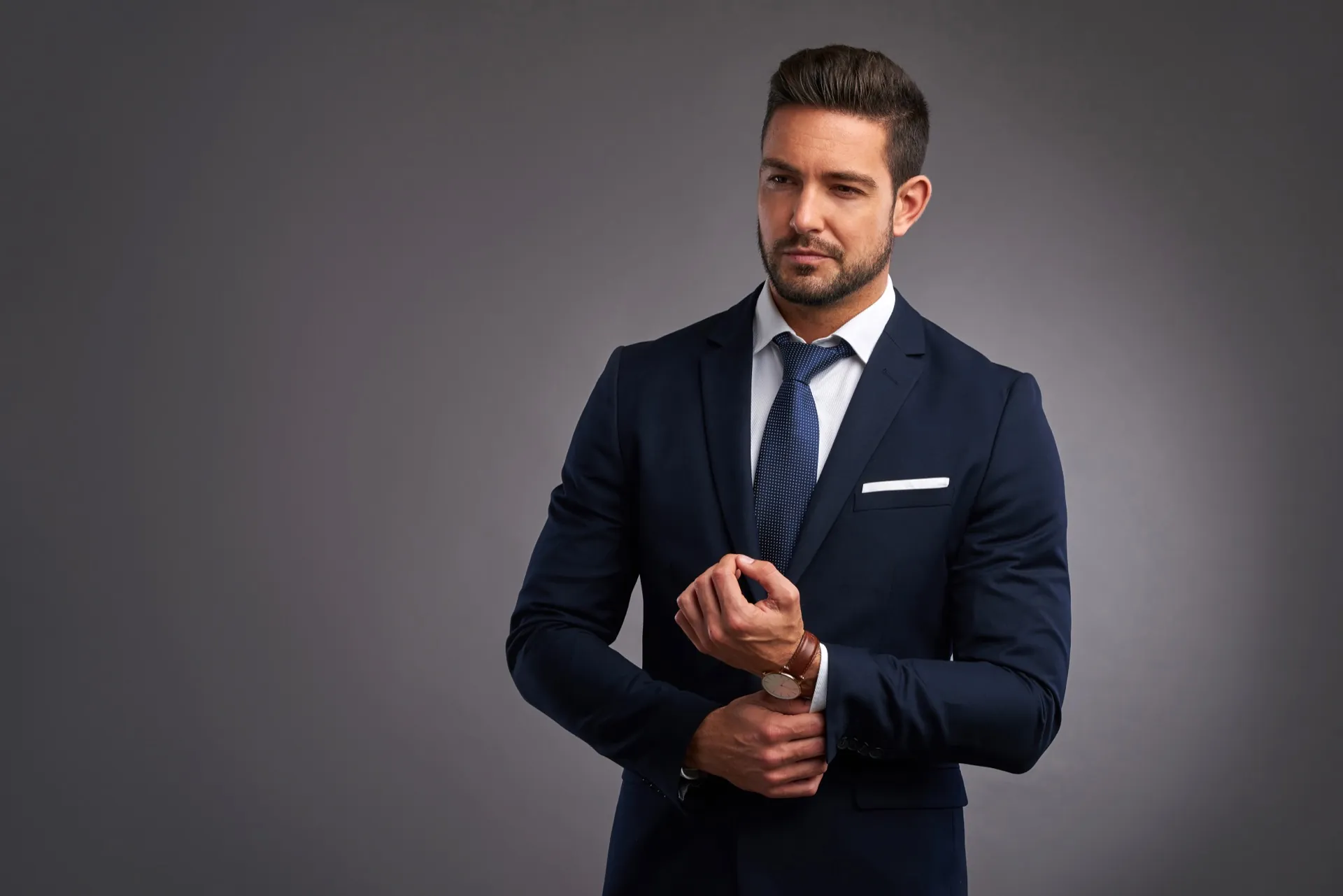 Confident well-dressed man representing restored confidence through penile injection therapy at Rewind Anti-Aging Miami