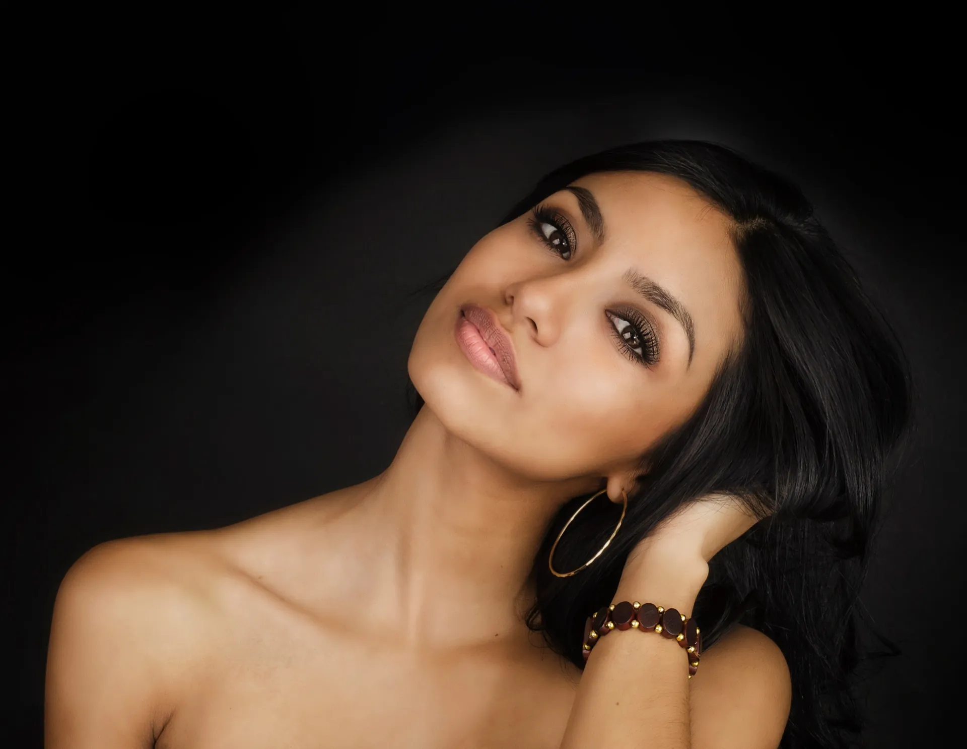 Woman with glowing skin representing dermal filler results at Rewind Anti-Aging Miami