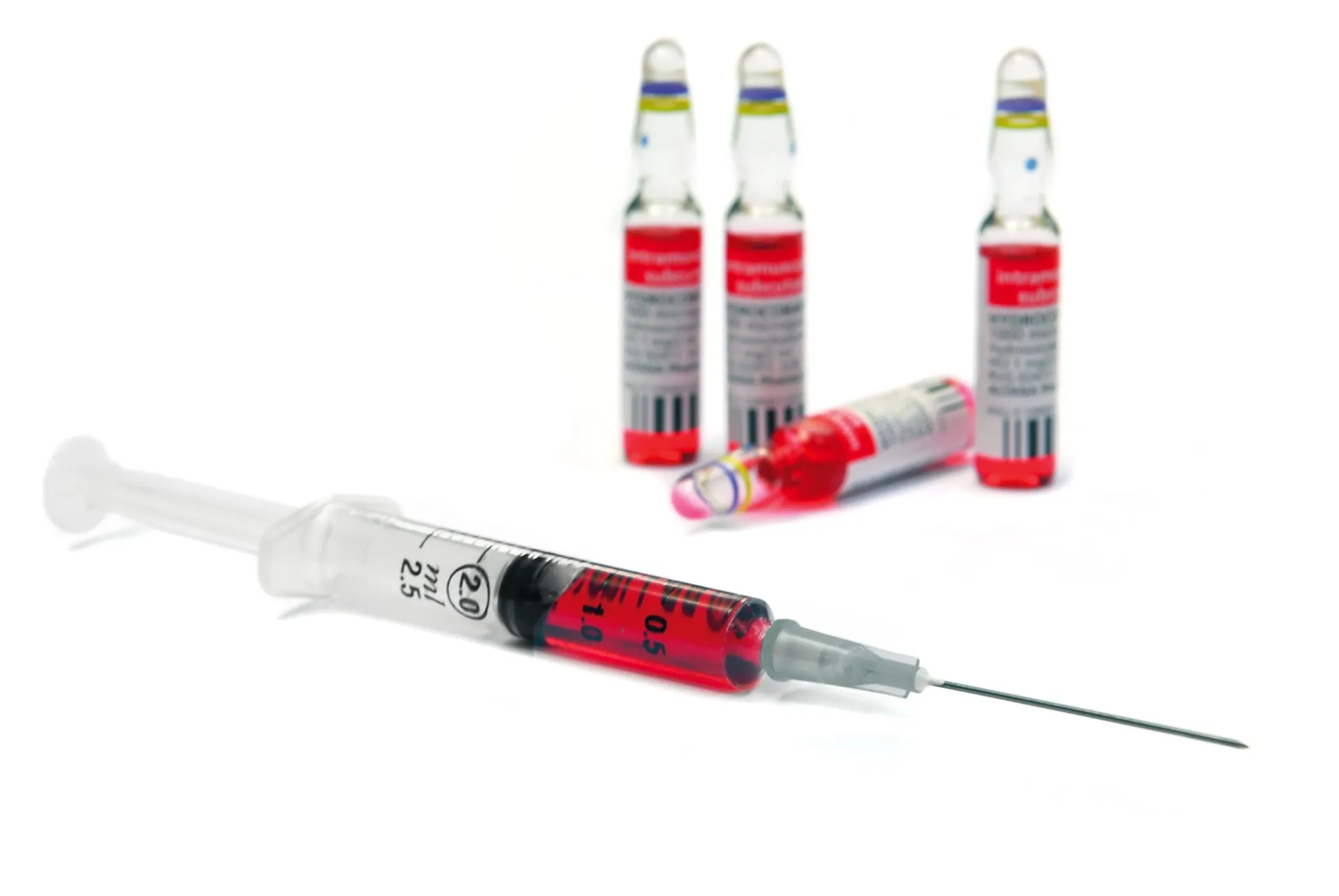 Medical injection vials and syringe representing lipotropic injection therapy at Rewind Anti-Aging Miami