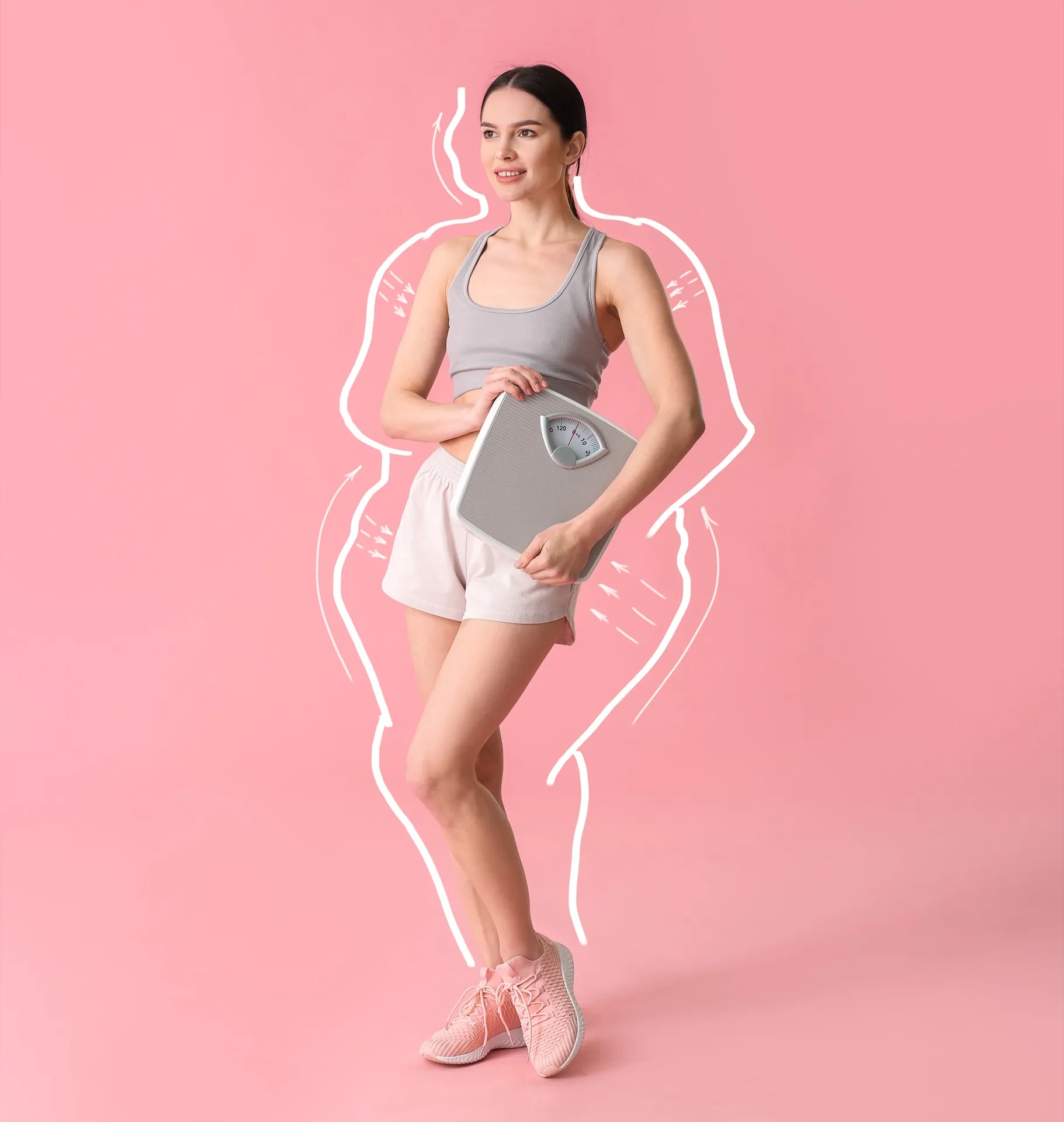 Woman holding scale celebrating weight loss with tirzepatide at Rewind Anti-Aging Miami