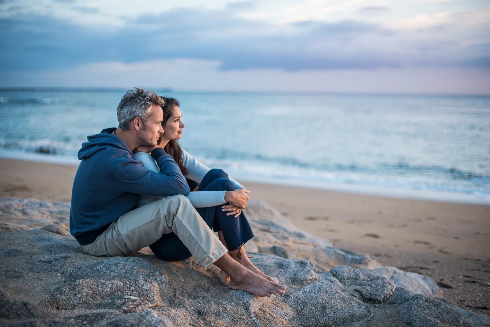 Couple at the beach at sunset — the long-term clinical relationships Rewind builds with Key Biscayne patients