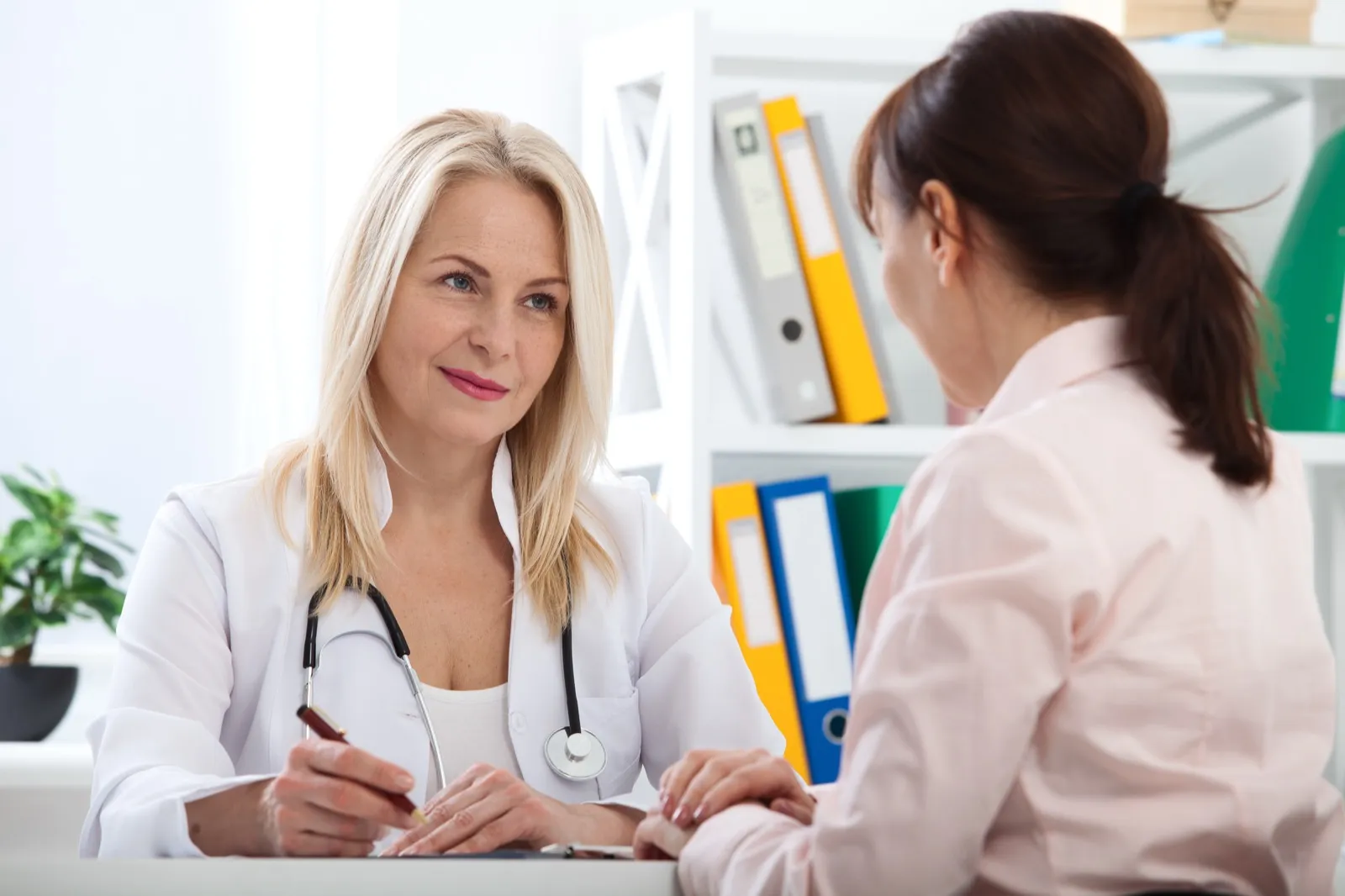Medical provider consulting with patient about personalized treatment at Rewind Anti-Aging Miami