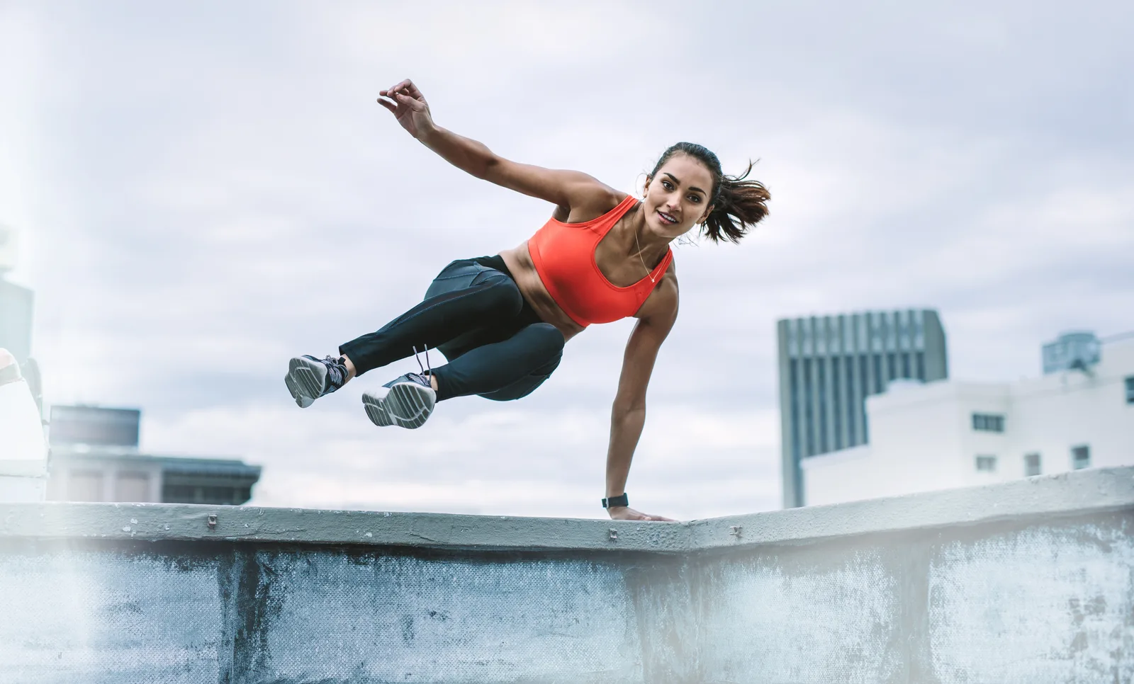 Athletic Miami patient training on an urban rooftop — hormone and body composition care