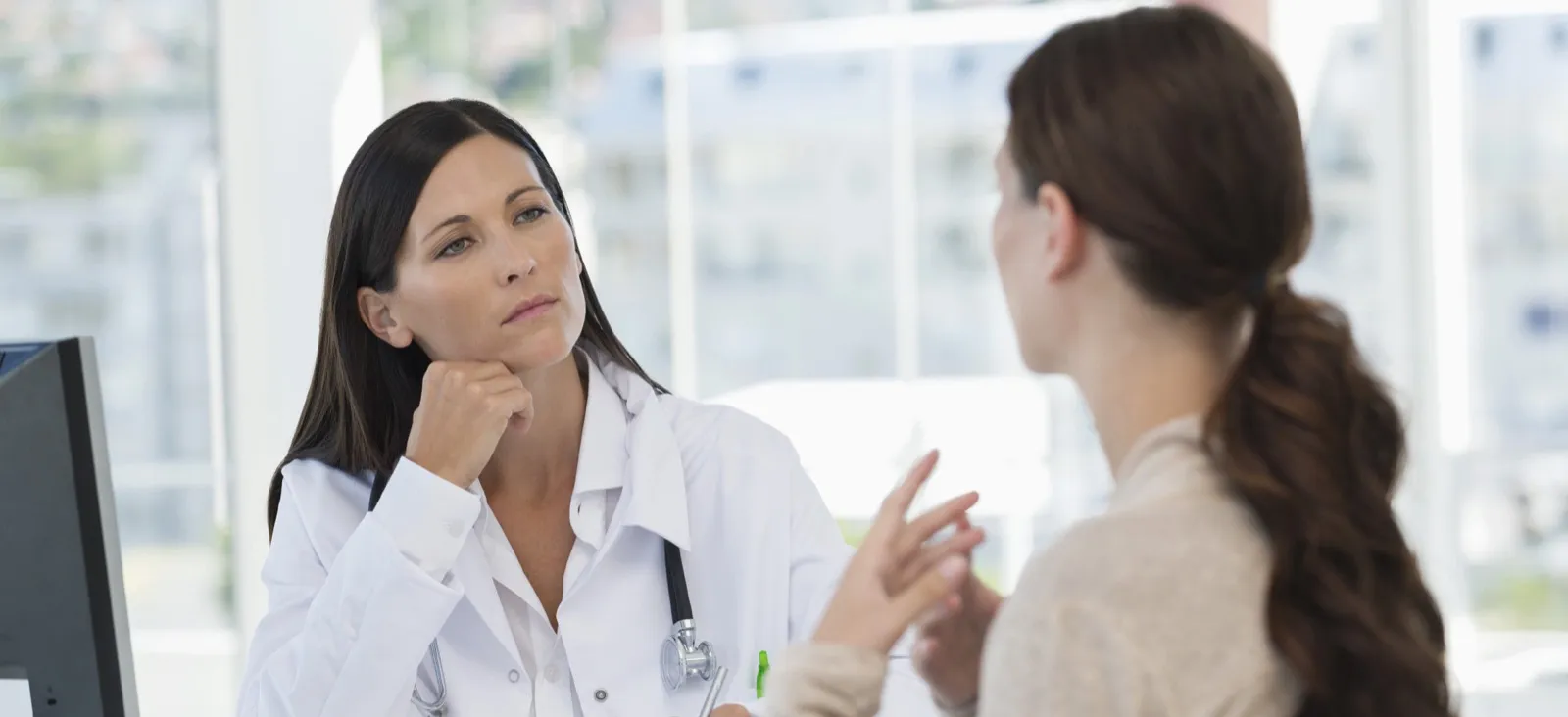 Physician reviewing comprehensive longevity protocol including full-body MRI results at Rewind Anti-Aging Miami
