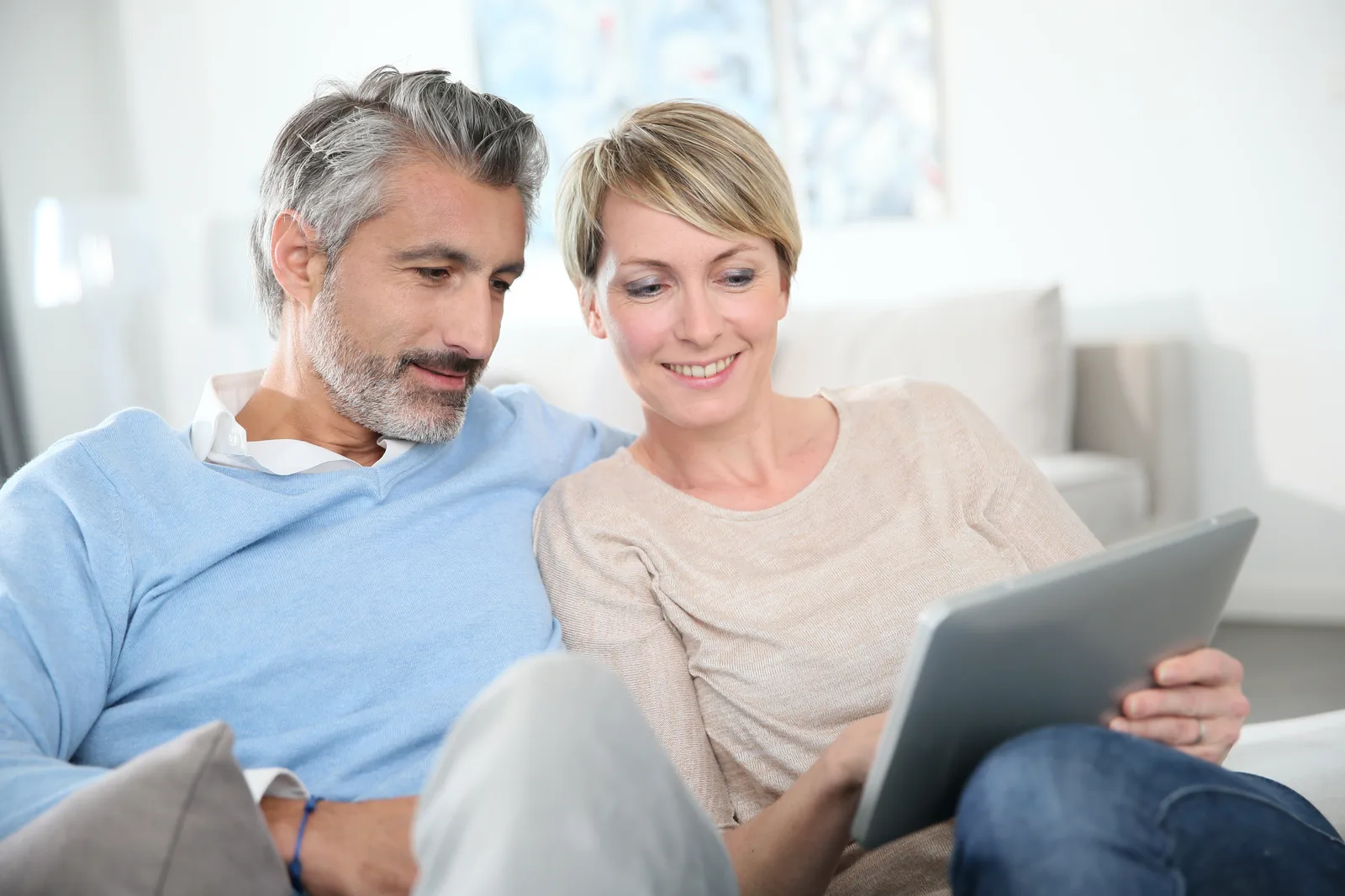 Mature Pinecrest couple at home — hormone therapy for the perimenopause and TRT transition decade with family-aware screening